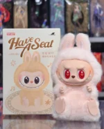 Pop Mart LABUBU Have a Seat plush figure with pink bunny costume